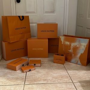 AUTHENTIC Louis Vuitton bundle of 7 boxes, three shopping bags and ribbons.